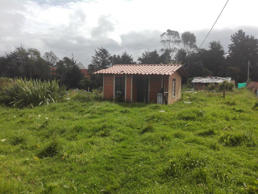 Vendo lote de tierra con casa en Santa Elena